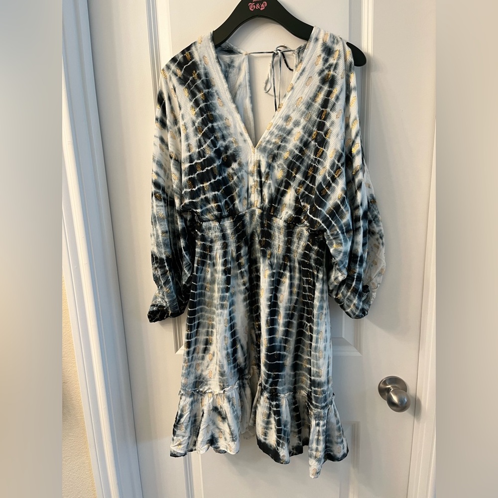 Tie dye black and white dress with low front and back and gold detailing!